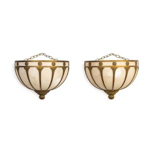 A pair of white alabaster and gilt bronze demi-lune wall lights,…