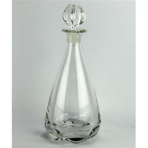 Orrefors rounded decanter with a etched signature to the base.…