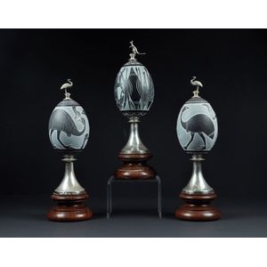 Donald (Bluey) Roberts, silver mounted carved emu egg on red…