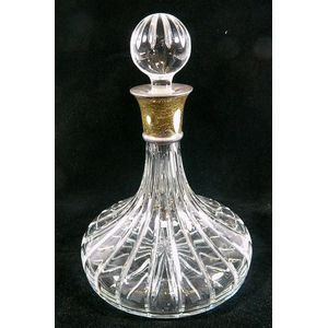 A crystal ships decanter, with sterling silver collar,…
