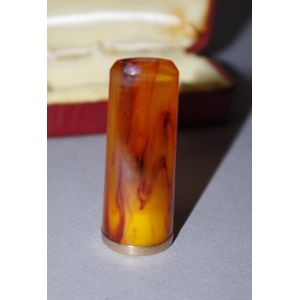 Early amber cigar holder, with gilt rim, in fitted box.