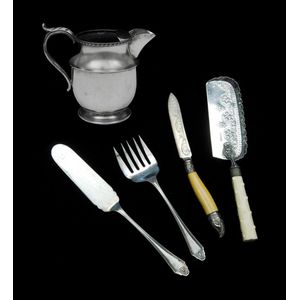 Four silverplated items. Ice water jug; fish servers; bread…