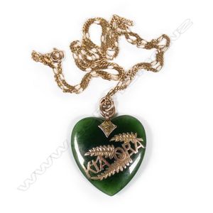 A colonial pounamu heart pendant, with 9ct rose gold fern…