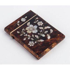 An antique card case, tortoiseshell and ivory with mother of…