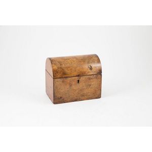 Victorian figured walnut domed tea caddy, two sectioned interior