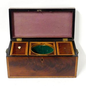 A Regency mahogany tea caddy with satinwood stringing, oblong,…