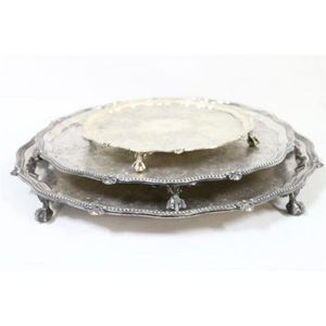 A graduated set of three Dixon silverplate trays with ball claw…