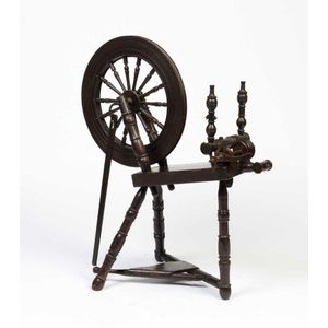 An oak spinning wheel, Continental, late 19th century, 95 cm…