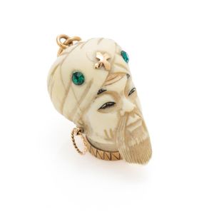 A VINTAGE18CT gold carved vegetable ivory Sultan pendant,&hellip;