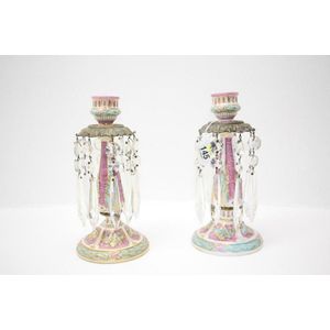 A pair of French china lustre candlesticks. On puce ground with…