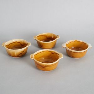 A set of four Crown Lynn honey glaze bowls, with white&hellip;