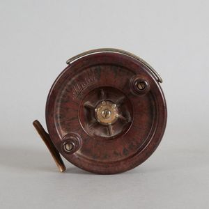 An A & W McCarthy Wood and Brass Fly Reel