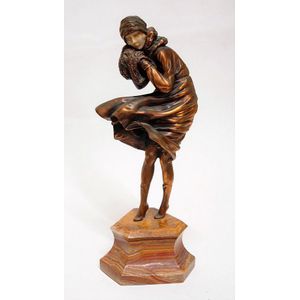 An Art Deco style figurine by Demetri Chiparus, The Squall',…