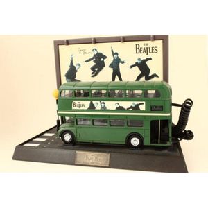 The Beatles Collector Bus telephone, depicting a green London…