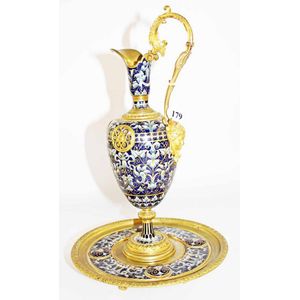 A French cloisonne ewer on stand, gilt brass with mask on…