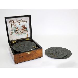 Small Polyphon 6½in disc music box, with polished walnut case,…