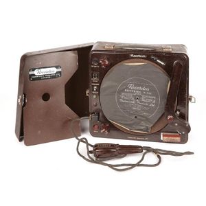 A vintage English Recordon disc machine, in a brown bakerlite…