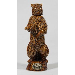 A 1968 Ezra Brooks 90 proof brown bear decanter, height 34 cm