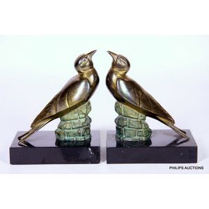 A pair of patinated spelter and marble bird bookends, circa…