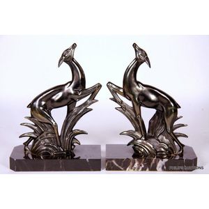 A pair of signed Art Deco spelter and marble deer bookends,…