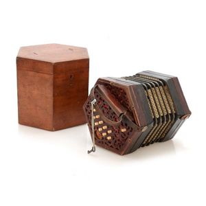 English Lachen & Co button Accordian. Wooden case. Appears…