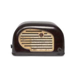 A Peter Pan 'Snail'mottled brown bakelite mantel radio, circa…