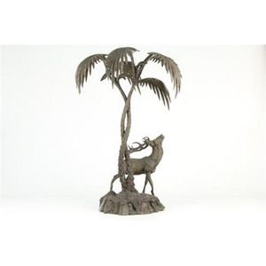 Edwardian spelter centrepiece of a stag modelled under a palm…
