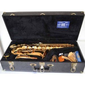 A cased Evette buffet Crampon Saxophone with accessories