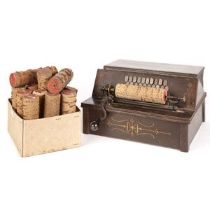 A Victorian gem roller organ with cobs, painted brown with gold…