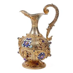Sacrament jug. European gold gilded silver (925), decorated…