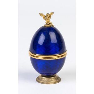 A silver gilt and enamel display egg by Sarah Faberge, St…