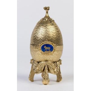 A silver gilt and enamel display egg by Sarah Faberge, St…