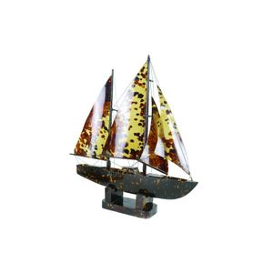 A vintage tortoiseshell constructed model yacht, the two masts…