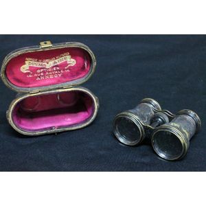 A cased set of French military binoculars, made by Duval Aine,…