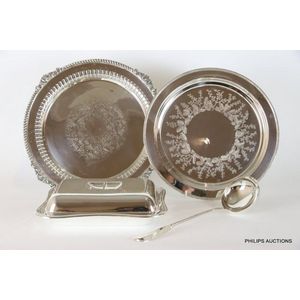 Two silver plated circular trays, a tureen and a Christofle…