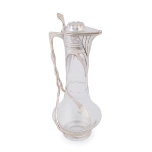 A German Art Nouveau crystal claret jug with silver plated…