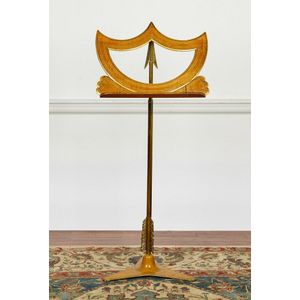 A Biedermeier brass and satinwood music stand, early 19th…