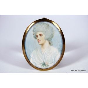 An antique French miniature painting of a woman in a gold…