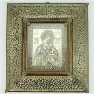 Greek icon 'Mother of God' set in a pierced timber frame.…