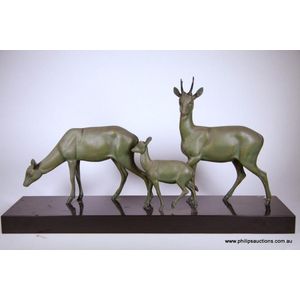A spelter animalier group, circa 1920, in green patinated…