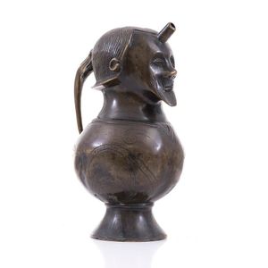 A bronze figural ewer, possibly Dutch, with a globular body…