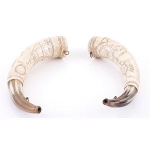 A pair of Australian horn scrimshaw powder mulls, the pair each…