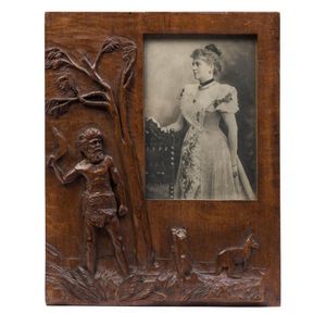 An Australian picture frame, carved Queensland maple with…