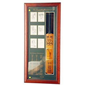A framed and signed Sir Donald Bradman cricket bat, with six…