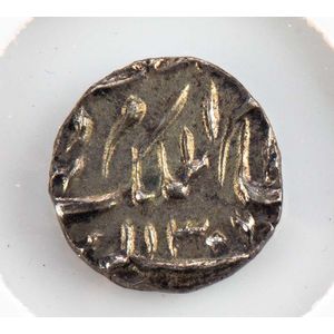 A gold Rupee dump, dated 1800 and a silver 1/8 Mohur, dated…
