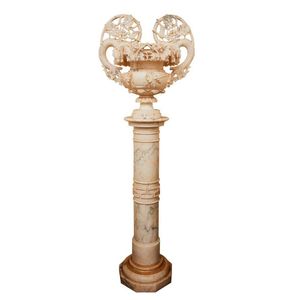 Italian marble urn on pedestal, c. 1900, the carved marble urn…
