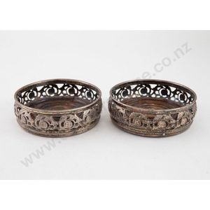 Pair WMF silver plate wine coasters with pierced floral and…