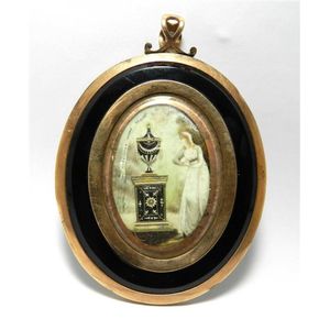 A Georgian mourning double sided portrait miniature, C1790,…