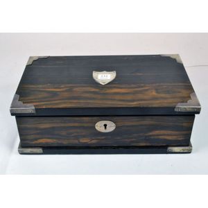 An Edwardian coromandel and silver bound gentleman's cigar box…