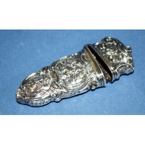 Antique silver etui, embossed decoration of figures in a garden,…